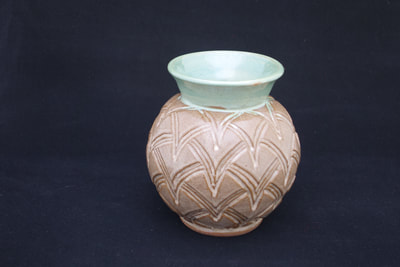 All images in gallery reflect various pottery pieces.